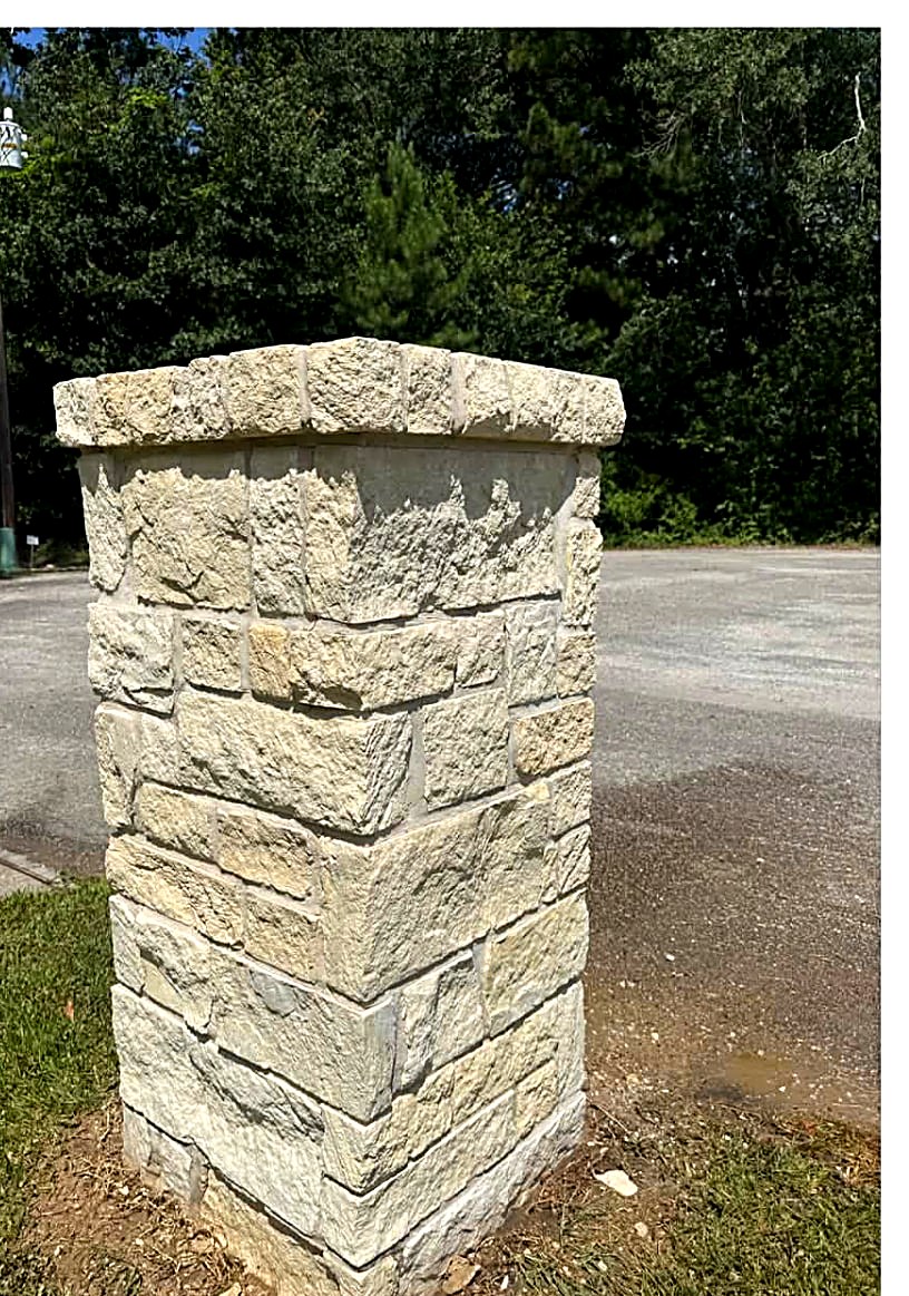 Limestone entry column cleaned to bright stone